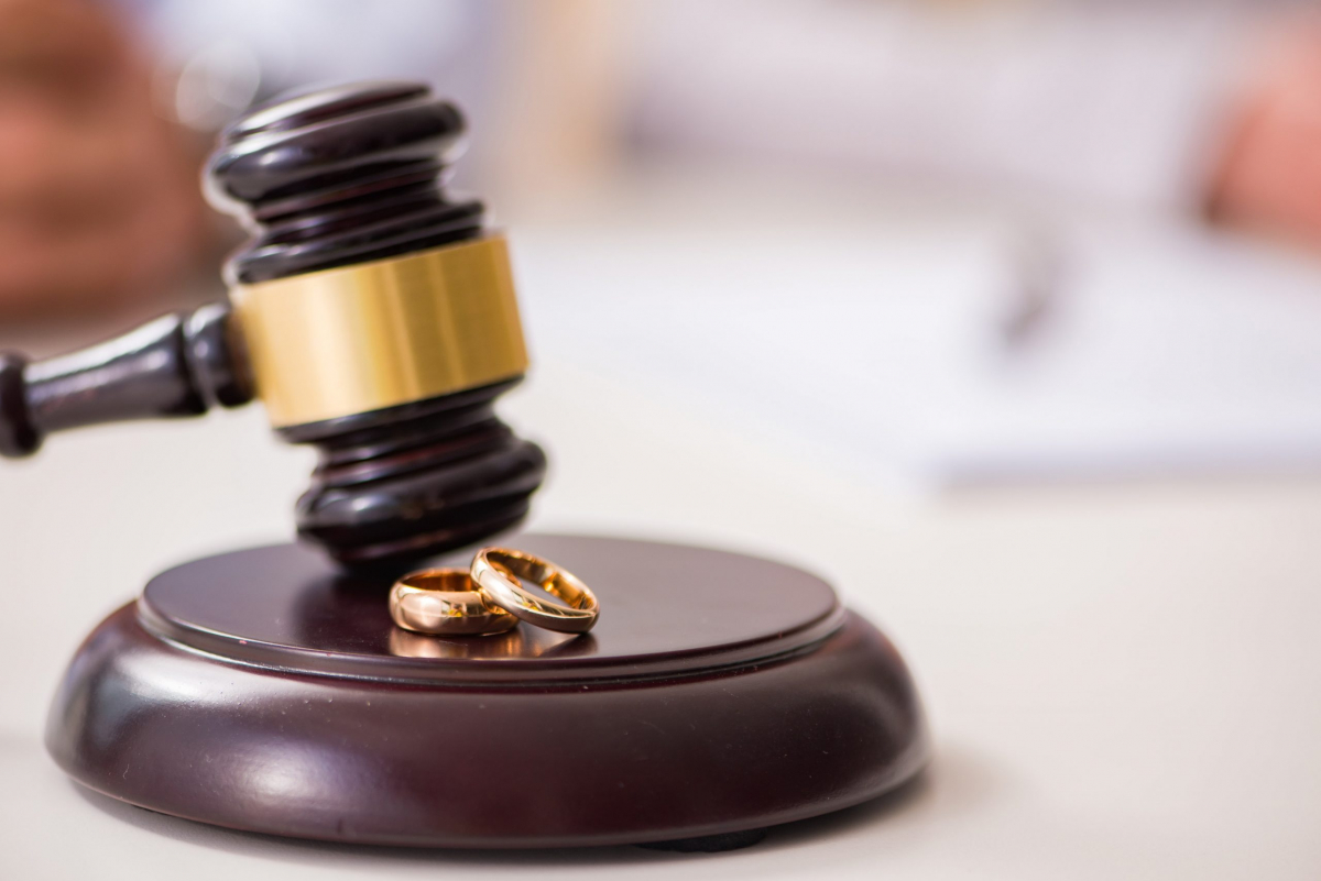 judge's hammer and wedding rings