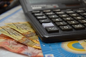 calculator, money and card
