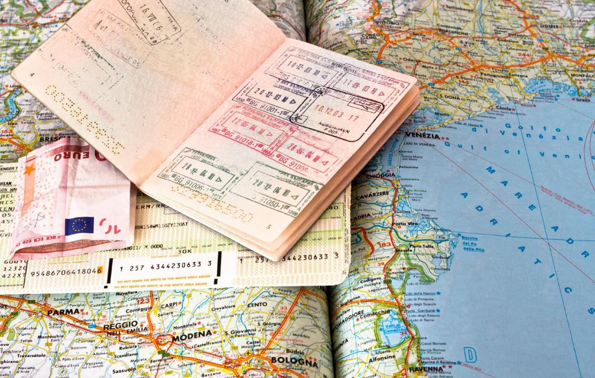 international passport and world map